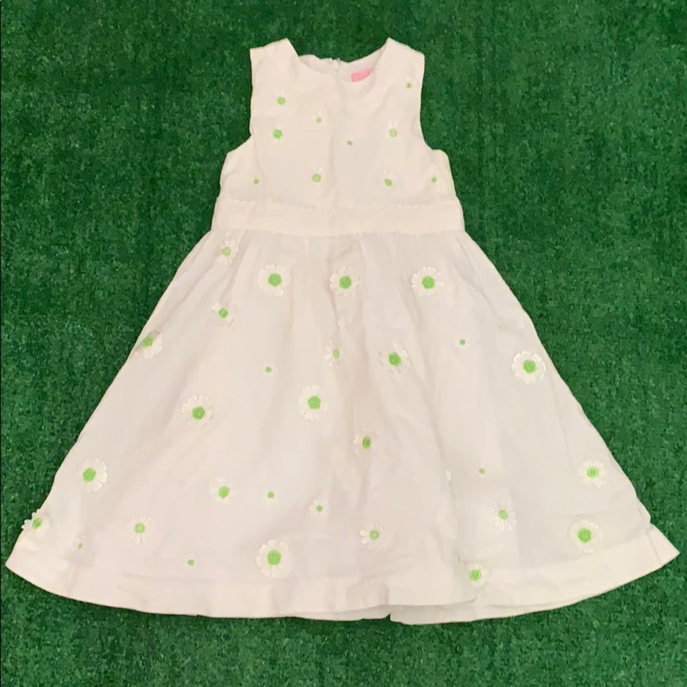 White dress with green and white lace flowers
